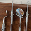 Dental Personalized Plaque with Dental Tools Close-up