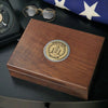 Walnut keepsake box with brass US Air Force medallion surrounded by engraved rim