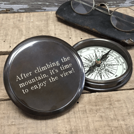 Open antiqued brass compass with three lines of optional text engraving on top lid